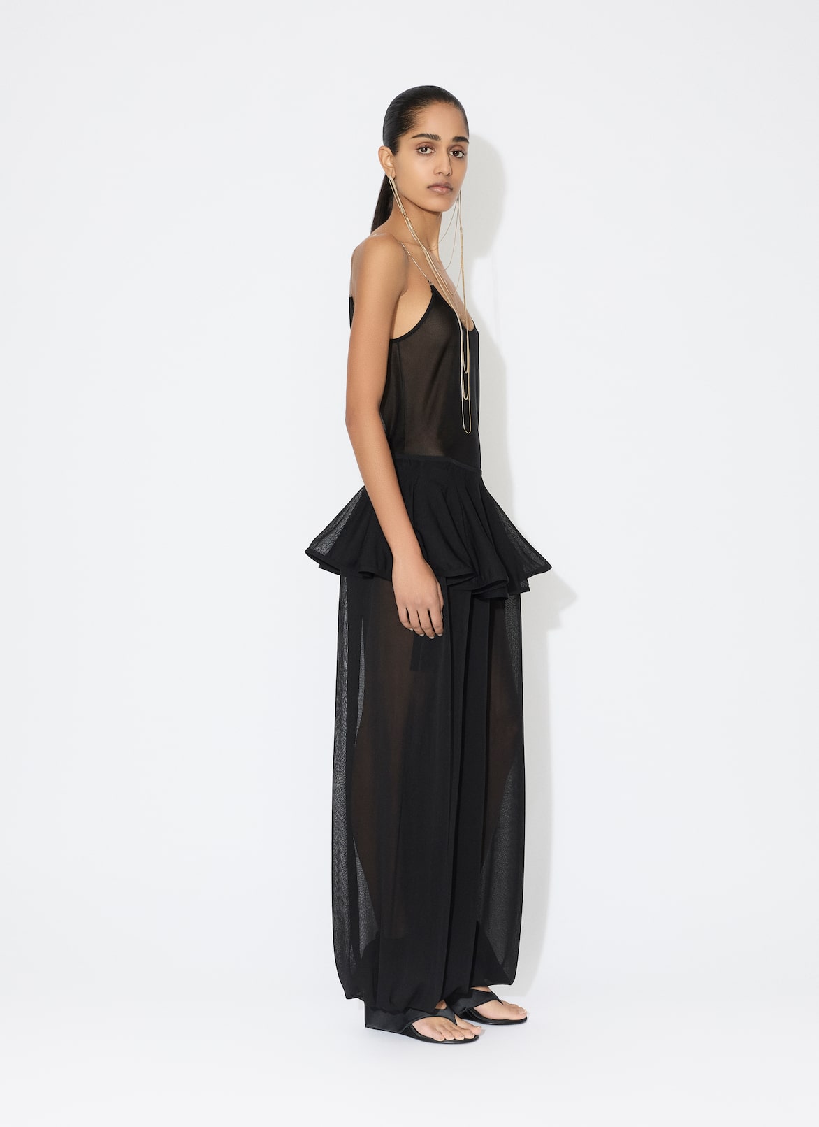 KNIT PEPLUM PANTS ALAÏA BLACK KNIT PEPLUM PANTS